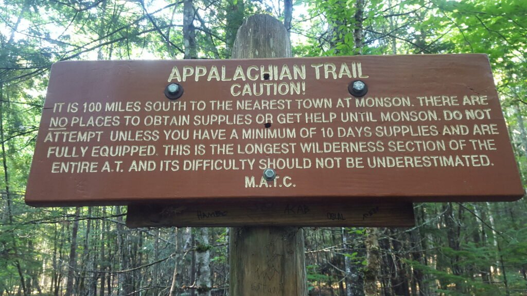 100 mile wilderness warning sign