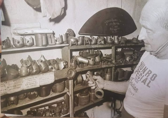 Burt Munro in his workshop